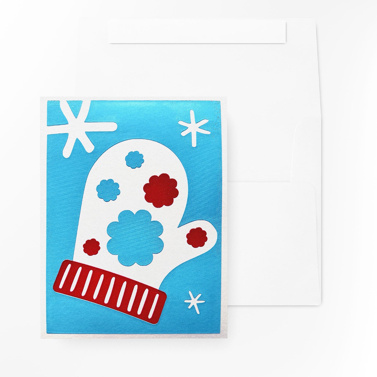 The Snow Blossom Mitten Card paired with a white, quick self-seal envelope, both presented in a clear cello sleeve for protection.