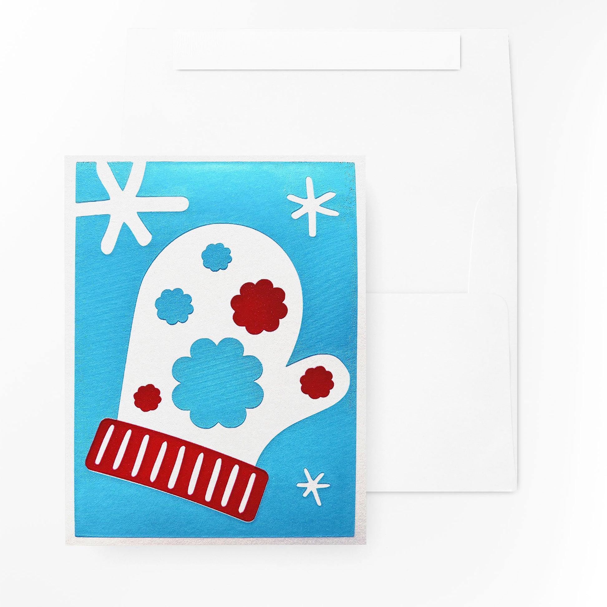 The Snow Blossom Mitten Card paired with a white, quick self-seal envelope, both presented in a clear cello sleeve for protection.