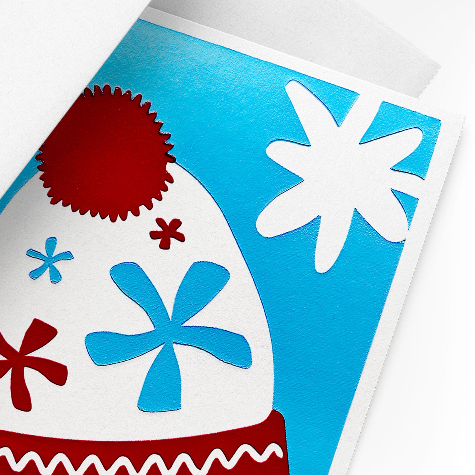 A detailed view of the Twinkling Beanie Card, focusing on the intricate design of the beanie and twinkling stars.