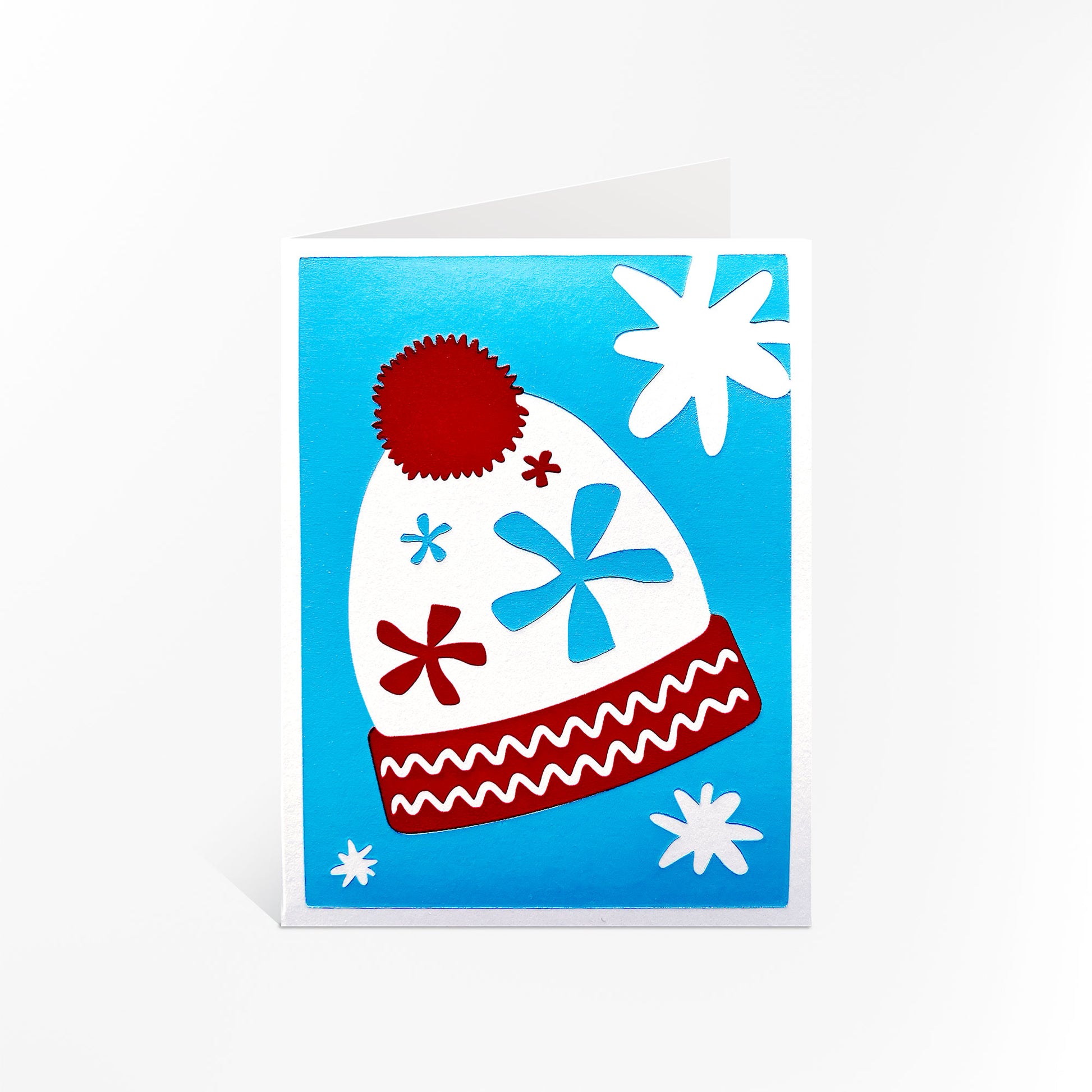 The Twinkling Beanie Card standing upright, highlighting its colorful and cheerful holiday theme.