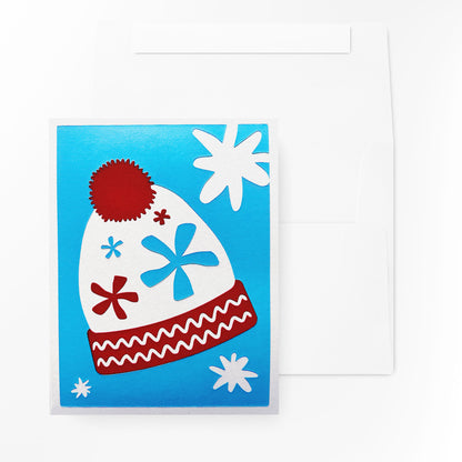 The Twinkling Beanie Card displayed with its matching self white envelope, ready for gifting.